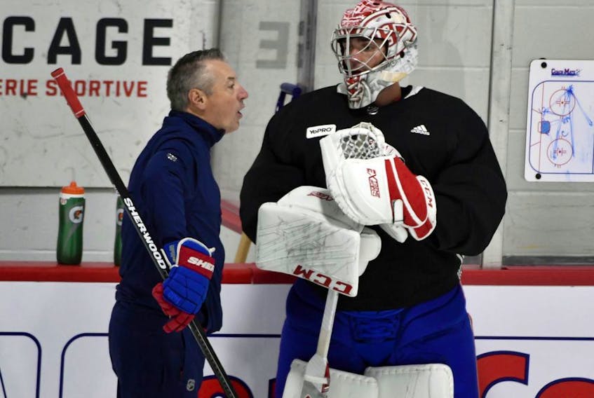 Stéphane Waite, shown here talking with Carey Price, had been the Canadiens' goalie coach since 2013.