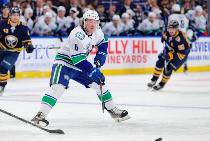 Vancouver Canucks right wing Brock Boeser (6) makes a pass during the first period against the Buffalo Sabres at KeyBank Center. 
