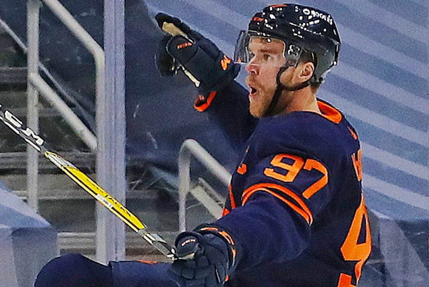 Oilers superstar Connor McDavid registered the first hat-trick of the NHL season and added an assist in Edmonton's 5-2 win over the Canucks on Thursday.