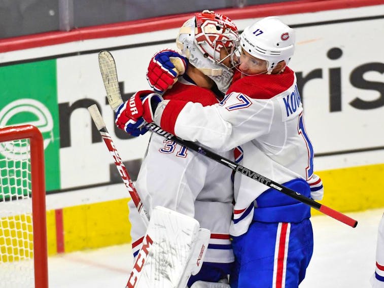  Canadiens goaltender Carey Price and left-winger Ilya Kovalchuk celebrate after defeating the Flyers on Jan. 16, 2020, in Philadelphia.