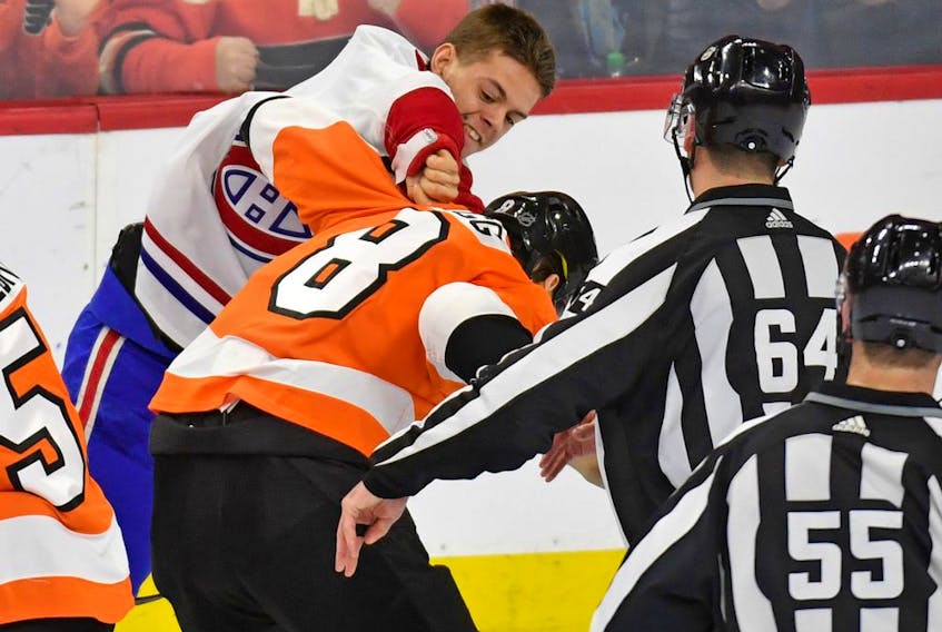  The Canadiens’ Jesperi Kotkaniemi and the Flyers’ Robert Hagg fight during the third period at the Wells Fargo Center in Philadelphia on Jan. 16, 2020.
