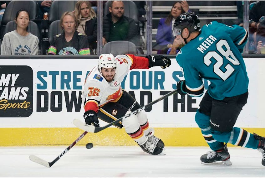 Calgary Flames left-winger Milan Lucic (17) reacts after scoring a power play goal against the San Jose Sharks  in the first period at SAP Center at San Jose. Mandatory Credit: John Hefti-USA TODAY Sports ORG XMIT: USATSI-405858