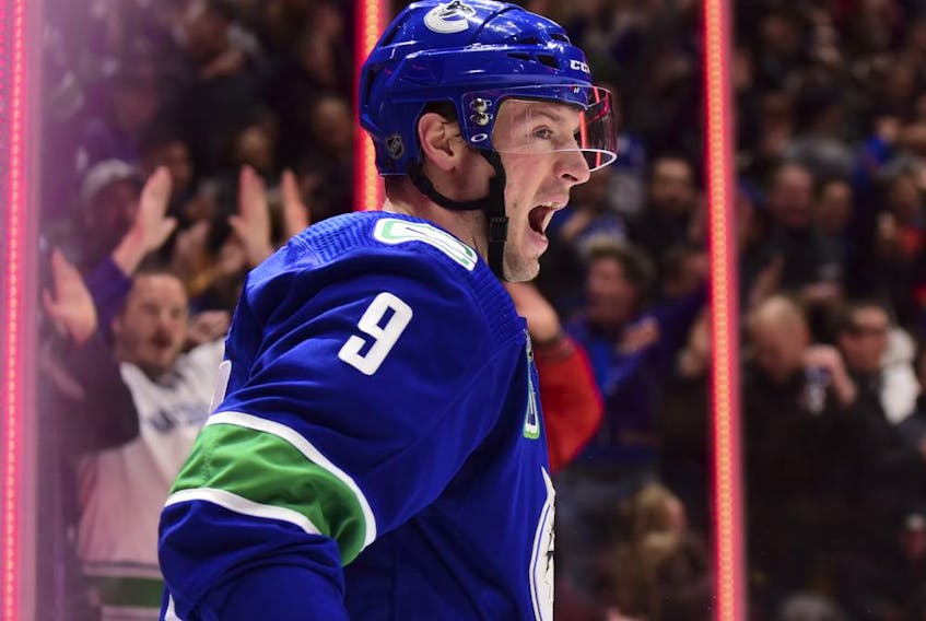 Vancouver Canucks forward J.T. Miller celebrates after scoring a goal against the Colorado Avalanche during the first period at Rogers Arena. 