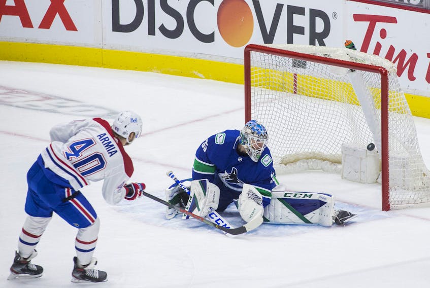 Montreal Canadiens forward Joel Armia (40) scores on Vancouver Canucks goalie Thatcher Demko (35) in the first period in a game at Rogers Arena Jan. 21, 2021. 