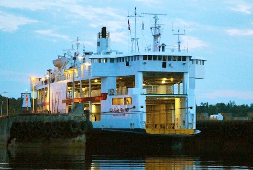 FILE PHOTO: The MV Holiday Island is shown at the Caribou terminal on its daily run between Wood Islands, P.E.I. and Nova Scotia in this 2014 file photo.</p>
<p>&nbsp;</p>