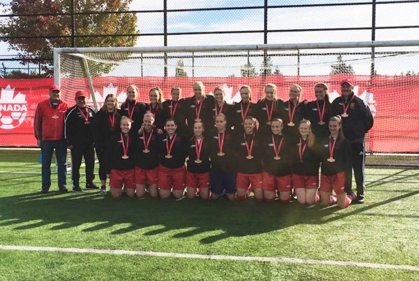 Members of the Holy Cross Avalon Ford soccer team pose with the bronze medals they won at the Jubilee Trophy national tournament in Surrey, B.C., on Monday. It’s the first-ever medal finish by a Newfoundland and Labrador team at a Canadian senior women’s soccer championship.