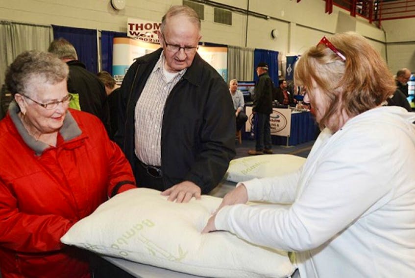 <span class="BodyText">Norma and Lindsay Seaman check out the bamboo pillows with Janet Pomeroy in the Ocean Sales booth at the P.E.I. Home Show at the Eastlink Centre in Charlottetown Friday. The show is on again today and Sunday and boasts over 150 booths.</span>