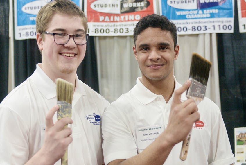 Student entrepreneurs Dawson MacIsaac, left, and Joshua Langston, saw the P.E.I. Home Show as a valuable networking experience for their Student Works companies. MacIsaac is the owner-operator of a Student Works window and eaves cleaning service while Langston is the owner-operator of a Student Works painting service. MITCH MACDONALD/THE GUARDIAN