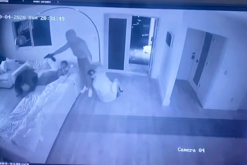Chilling surveillance video captured a gunfight that broke out after armed intruders stormed a home in Florida’s Miami-Dade on the night of Oct. 4.