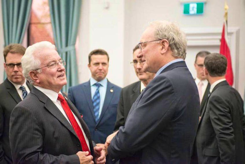 Bush Dumville, left, chats with Premier Wade MacLauchlan during the opening of the P.E.I. Legislature.
(The Guardian)