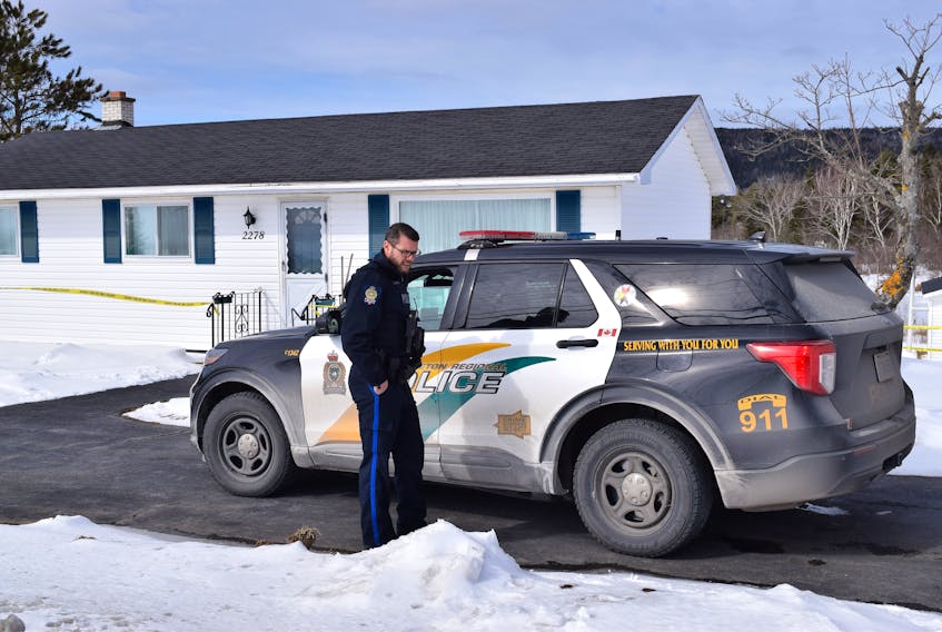 Const. Brett Bursey of the Cape Breton Regional Police Service on the scene Friday afternoon at 2278 Kings Rd. in Howie Centre,  where a 71-year old woman was found dead Friday morning and a 73-year old man was taken into custody. Sharon Montgomery-Dupe/Cape Breton Post