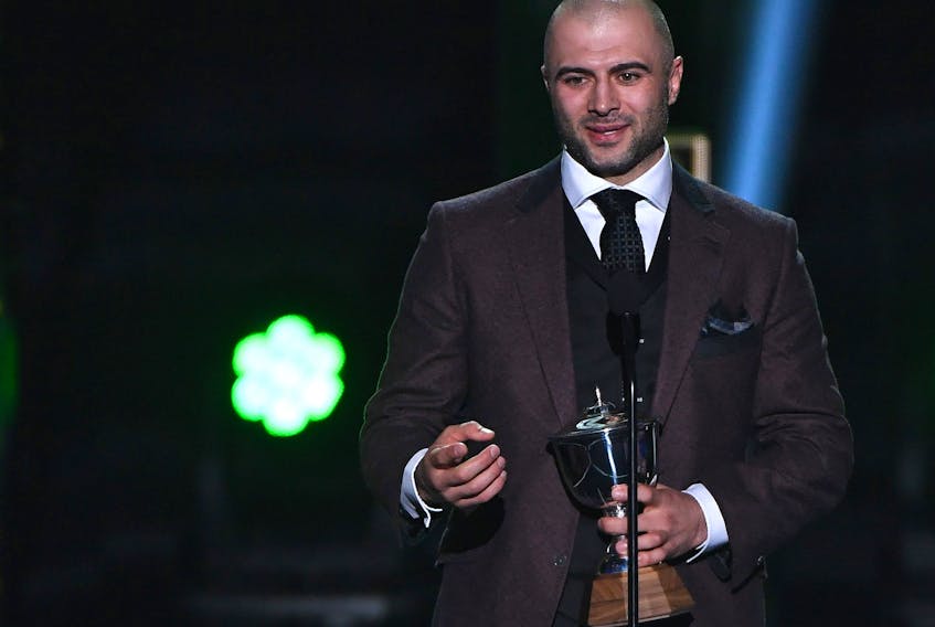 Mark Giordano of the Calgary Flames accepts the James Norris Memorial Trophy awarded to the defense player who demonstrates throughout the season the greatest all-around ability in the position during the 2019 NHL Awards at the Mandalay Bay Events Center on June 19, 2019 in Las Vegas. (Ethan Miller/Getty Images)