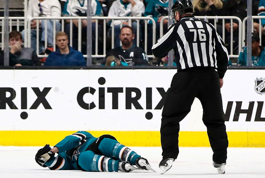 Joe Pavelski of the San Jose Sharks lies on the ice after a hard hit at SAP Center on April 23, 2019 in San Jose. (Ezra Shaw/Getty Images)  