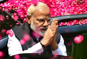  Indian Prime Minister and Bharatiya Janata Party leader Narendra Modi arrives to file his election nomination papers in Varanasi on April 26, 2019.