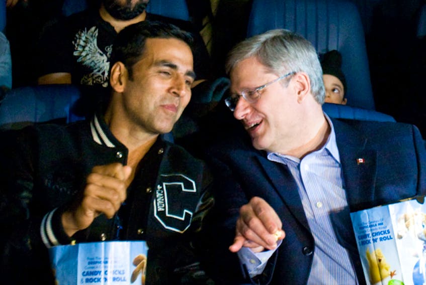  Bollywood actor Akshay Kumar at Toronto movie theatre with then-prime minister Stephen Harper on April 8, 2011.