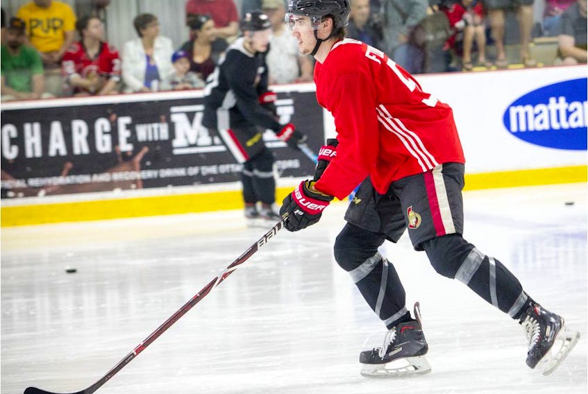 Alex Formenton takes the puck down the ice during the Ottawa Senators development camp in 2019.