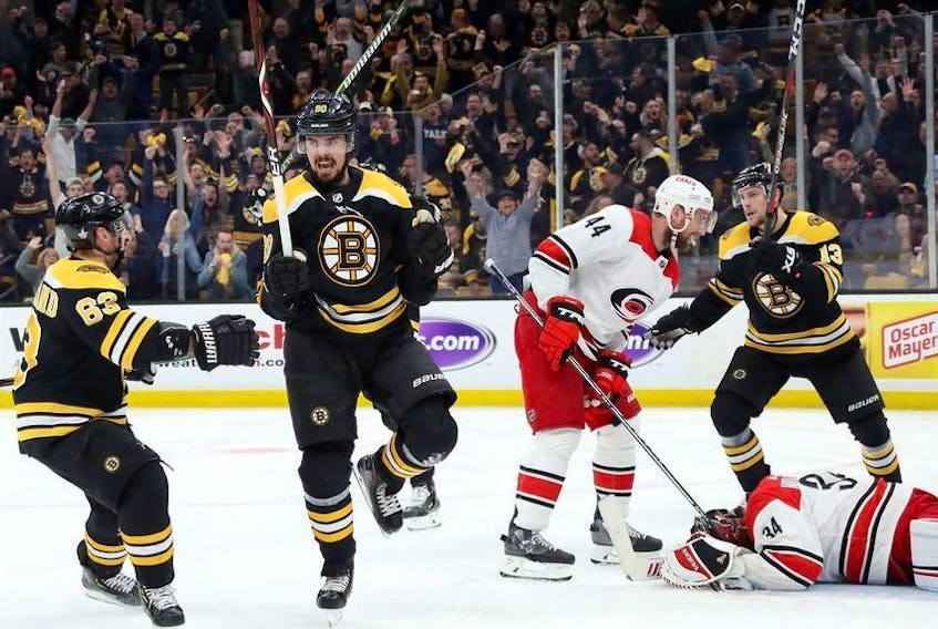  Marcus Johansson #90 of the Boston Bruins celebrates after scoring a third period goal against the Carolina Hurricanes in Game One of the Eastern Conference Final during the 2019 NHL Stanley Cup Playoffs at TD Garden on May 09, 2019 in Boston, Massachusetts.