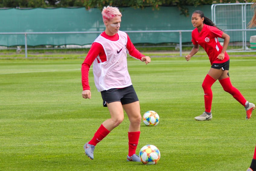  Canada’s Sophie Schmidt, left, takes part in a drill while teammate Jayde Riviere looks on at a training session at the Stade Jean Boucton in Reims, France on Tuesday, June 18. Canada plays the Netherlands in their final Group E game at the 2019 FIFA Women’s World Cup at the Stade Auguste Delaune in Reims on Thursday. (Derek Van Diest / Postmedia)