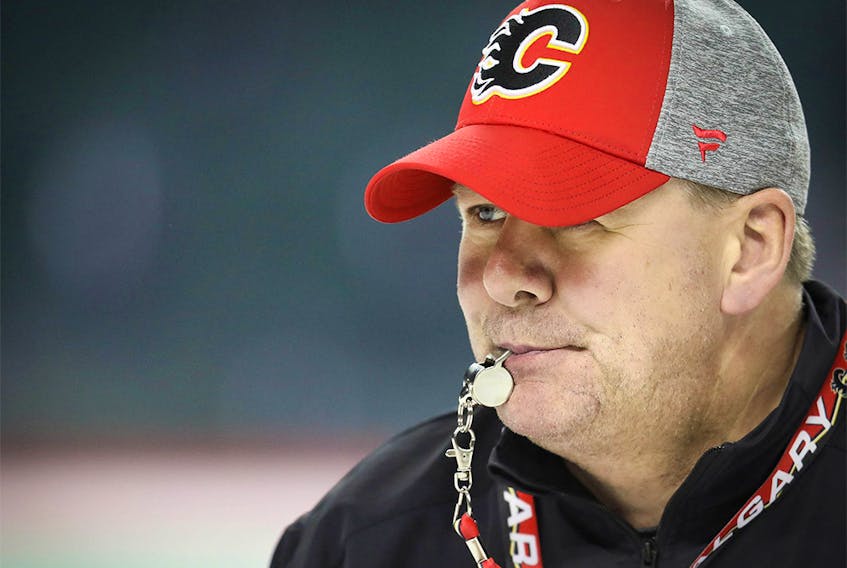 Calgary Flames head coach Bill Peters during practice at the Scotiabank Saddledome in Calgary on April 9, 2019.