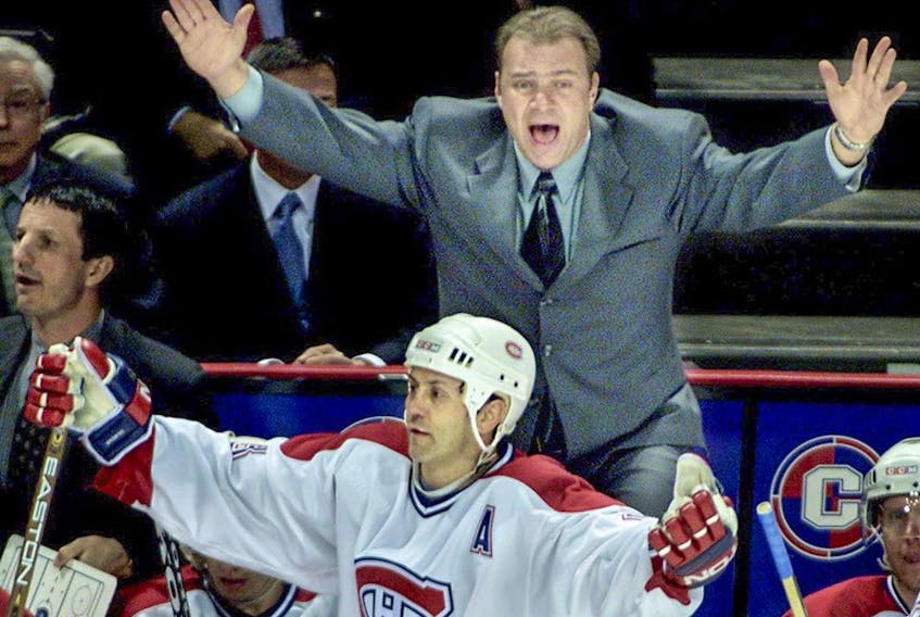  Head coach Michel Therrien and Montreal Canadiens forward Doug Gilmour are up in arms on Jan. 30, 2002.