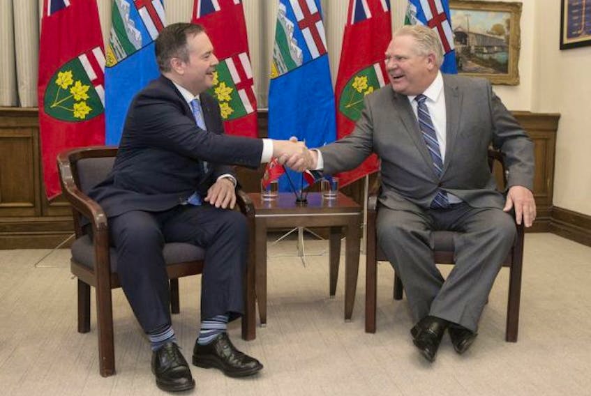  Ontario Premier Doug Ford, right, meets with Alberta Premier Jason Kenney at the Ontario Legislature last week. Conservative premiers are deeply unimpressed with carbon taxes.