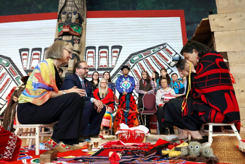 Commissioners prepare to handover the final report during the closing ceremony of the National Inquiry into Missing and Murdered Indigenous Women and Girls in Gatineau, Quebec, June 3, 2019.