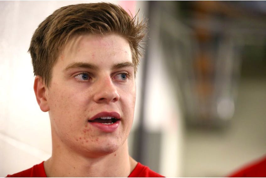 Jeremy McKenna speaks to media following an on ice session during the Calgary Flames development camp at Winsport in Calgary on Thursday, July 4, 2019. Jim Wells/Postmedia