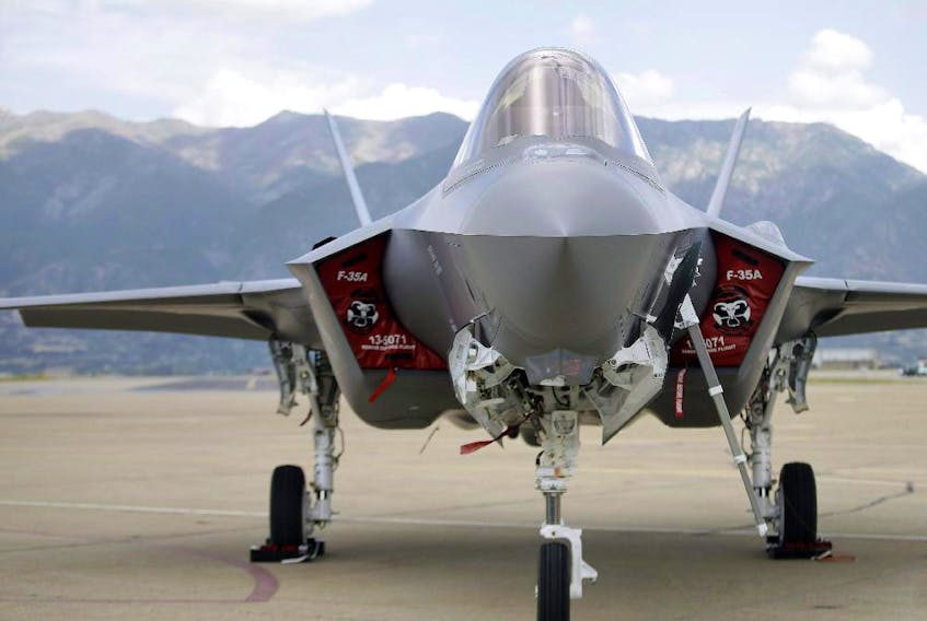 An F-35 jet sits on the tarmac at its new operational base Wednesday, Sept. 2, 2015, at Hill Air Force Base, in northern Utah. 