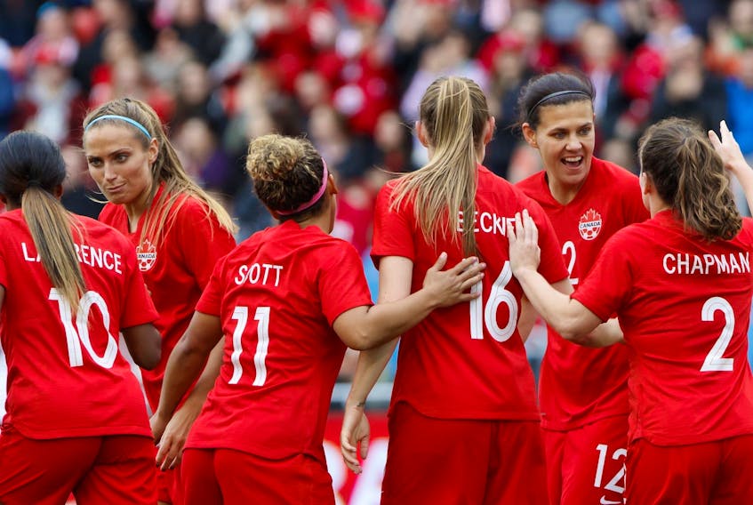  Team Canada’s Shelina Zadorsky (4) and Christine Sinclair (12) celebrate a goal by midfielder Jessie Fleming (17) with teammates during the first half of a women’s international soccer friendly against Mexico at BMO Field in Toronto, Saturday, May 18, 2019. Cole Burston / CP