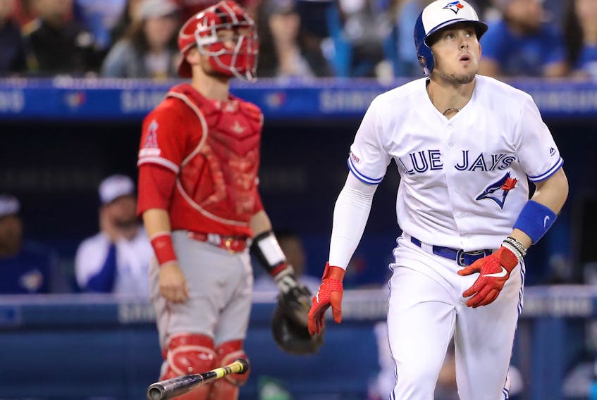 Cavan Biggio of the Toronto Blue Jays watches as he hits a two-run home run in the eighth inning during MLB game action against the Los Angeles Angels at Rogers Centre on June 17, 2019 in Toronto. (Tom Szczerbowski/Getty Images)