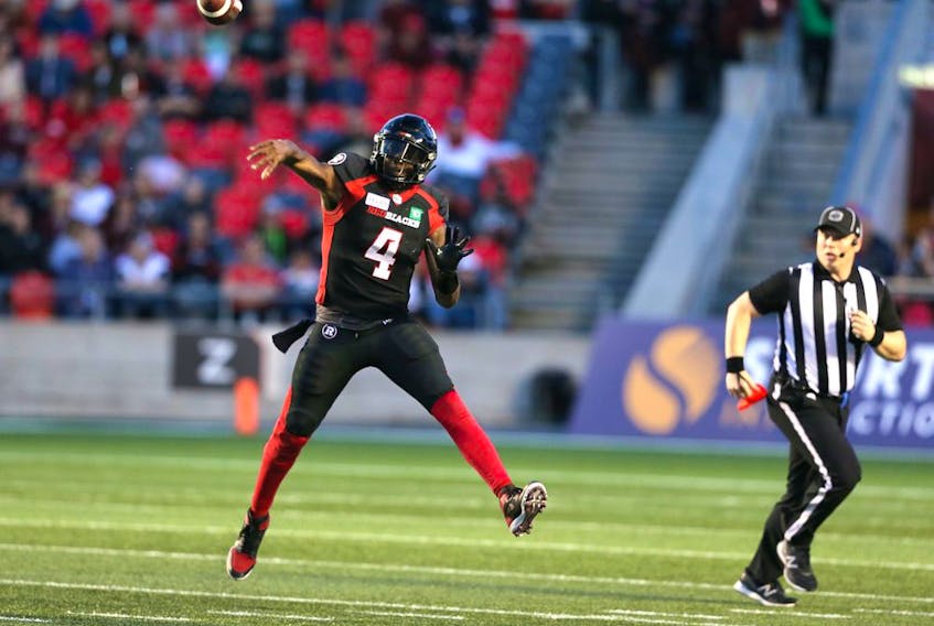 Dominique Davis throws a bomb in the first half as the Ottawa Redblacks take on the Saskatchewan Roughriders in CFL action at TD Place in Ottawa. 