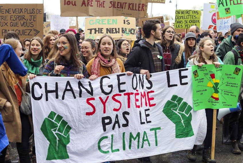 Montreal demonstrators take part in the worldwide Youth Climate Strike in March 2019. Friday's massive climate march will see a large part of downtown Montreal closed to motorists.