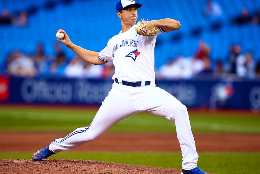  Jacob Waguespack of the Toronto Blue Jays delivers a pitch in the second inning during a MLB game against the Boston Red Sox at Rogers Centre on July 3, 2019 in Toronto.  