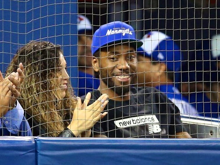 Kawhi Leonard of the Toronto Raptors watches a MLB game between the Los Angeles Angels of Anaheim and the Toronto Blue Jays at Rogers Centre on June 20, 2019 in Toronto, Canada.  (Photo by Vaughn Ridley/Getty Images)