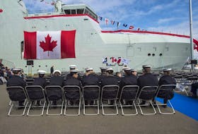 Royal Canadian Sea Cadets wait for the start of the naming ceremony for Canada's lead Arctic and Offshore Patrol Ship, the future HMCS Harry DeWolf, at Halifax Shipyard in Halifax on Friday, Oct. 5, 2018.