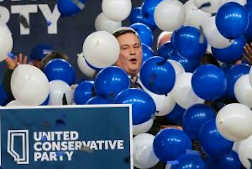 Jason Kenney is covered in balloons as he celebrates after being elected leader of the United Conservative Party. The leadership race winner was announced at the BMO Centre in Calgary on Saturday, Oct. 28, 2017. 