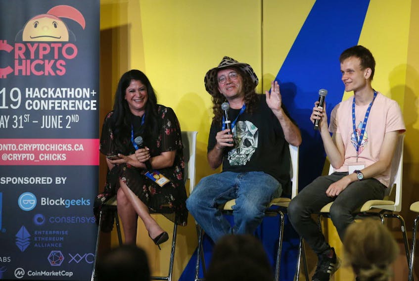 Toronto Sun Editor-in-Chief Adrienne Batra moderated the Crypto-Chicks 2019 Hackathon as Ben Goertzel (middle) and Vitalik Buterin (right) talked about crypto currency and blockchains on Saturday June 1, 2019. (Jack Boland/Toronto Sun/Postmedia Network)