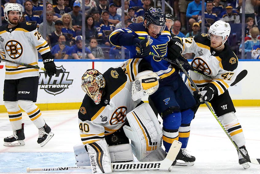 Alexander Steen #20 of the St. Louis Blues and Torey Krug #47 of the Boston Bruins battle in front of Tuukka Rask #40 during the third period in Game Six of the 2019 NHL Stanley Cup Final at Enterprise Center on June 09, 2019 in St Louis, Missouri. (Photo by Bruce Bennett/Getty Images)