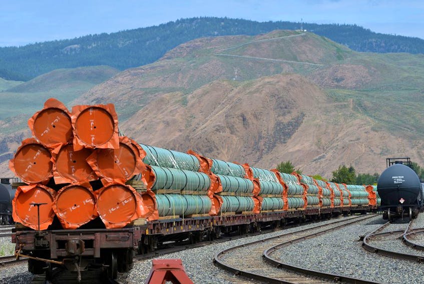 Steel pipe to be used in the oil pipeline construction of Kinder Morgan Canada's Trans Mountain expansion project sit on rail cars at a stockpile site in Kamloops, British Columbia, Canada May 29, 2018. 