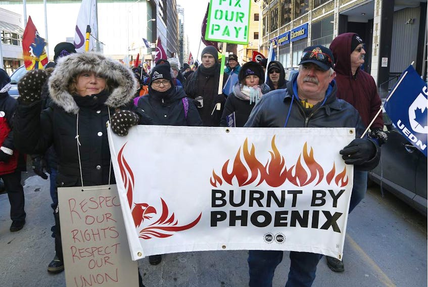 PSAC members protest the Phoenix pay system on Laurier Ave in Ottawa Thursday, Feb 28, 2019. 