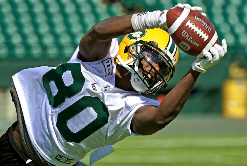 DaVaris Daniels makes a diving catch during the Edmonton Eskimos training camp on Tuesday May 21, 2019 at Commonwealth Stadium in Edmonton.