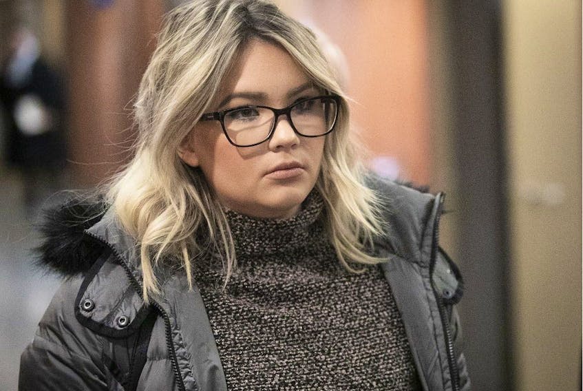 Alison De Courcy-Ireland leaves a Montreal courtroom on Feb. 7, 2019. De Courcy-Ireland is the woman charged with being impaired while behind the wheel of a truck owned by former Montreal Canadien Zach Kassian.     