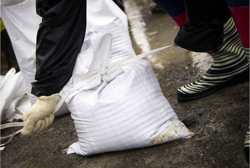 Ottawa and Gatineau are seeking volunteers to help fill sandbags on Friday.   Ashley Fraser/Postmedia