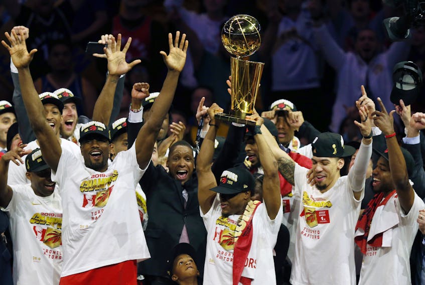  The Toronto Raptors celebrates with the Larry O'Brien Championship Trophy after they defeated the Golden State Warriors last night at Oracle Arena. (Getty Images) 