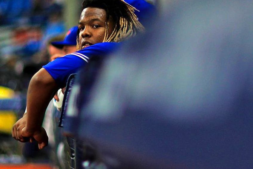  Vladimir Guerrero Jr. of the Toronto Blue Jays looks on in the 10th inning during a game against the Tampa Bay Rays at Tropicana Field on May 29, 2019 in St Petersburg, Florida.