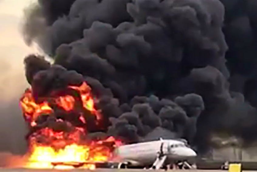 This handout grab of a video obtained from the Instagram account of Gunkevitch on May 5, 2019, shows a fire of a Russian-made Superjet-100 at Sheremetyevo airport outside Moscow. 