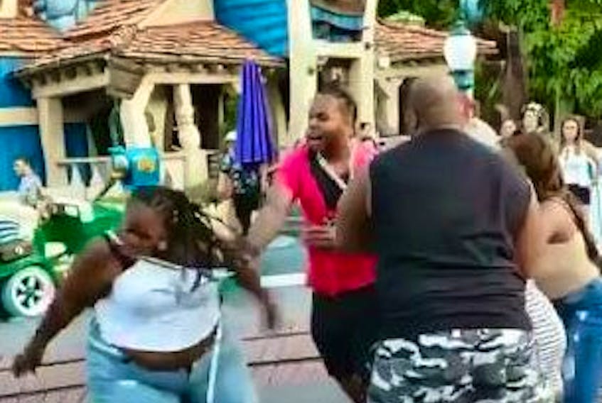 Police investigate a violent family brawl that broke out on June 6, 2019 at Disneyland California. Twitter/viral video