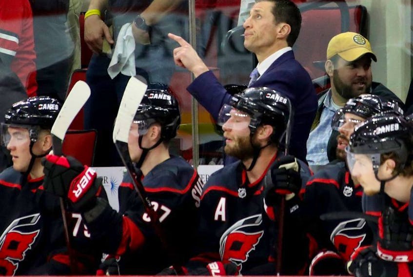Hurricanes head coach Rod Brind'Amour looks on against the Bruins during first period NHL playoff action in Game 3 of the Eastern Conference Finals at PNC Arena in Raleigh, N.C., on Tuesday, May 14, 2019.
