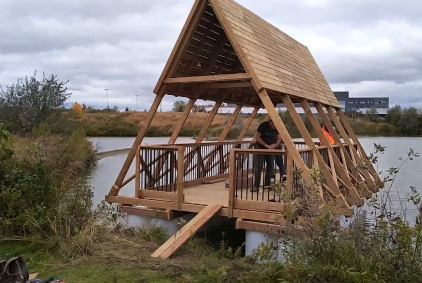 University of Waterloo professor Elizabeth English's team has built a floating research pavilion on a pond at the University of Waterloo using an NRC research grant to test materials that can best  withstand Canada's freeze-thaw cycle.