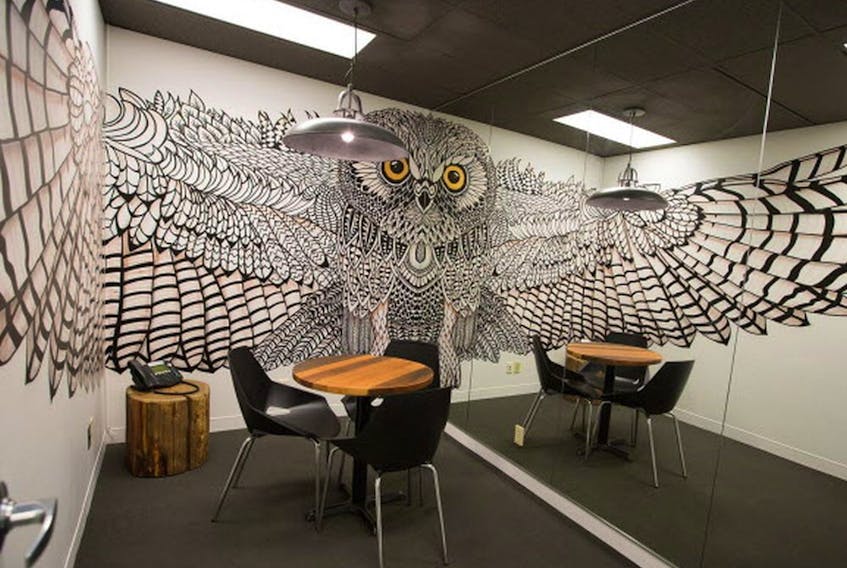 Hootsuite Inc., a B.C. startup that builds software to help marketers use social media, is said to be for sale. A meeting room in a Hootsuite office in Vancouver.  